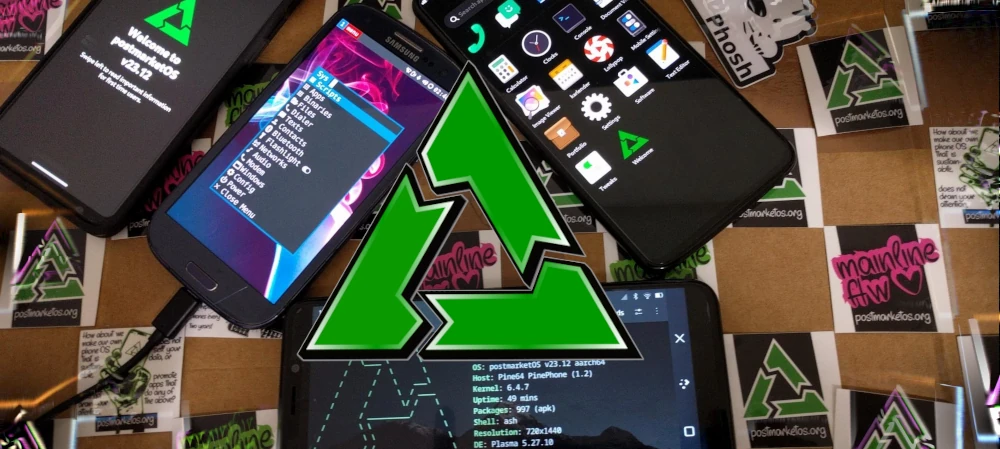 A big variation of the postmarketOS logo, around it are phones with Sxmo, Plasma Mobile, Phosh and GNOME Shell on Mobile; the phones are lying on top of lots of postmarketOS stickers on a piece of cardboard.